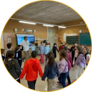 Students at a Catalan school doing an activity in a circle in the classroom