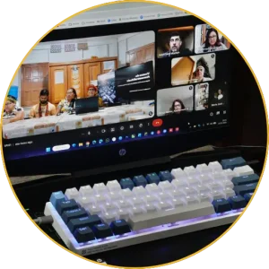 Video call between Network schools seen on a laptop screen