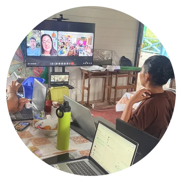 Educators at Escola Ixubãy Rabuī Puyanawa on a video call with schools in Catalonia