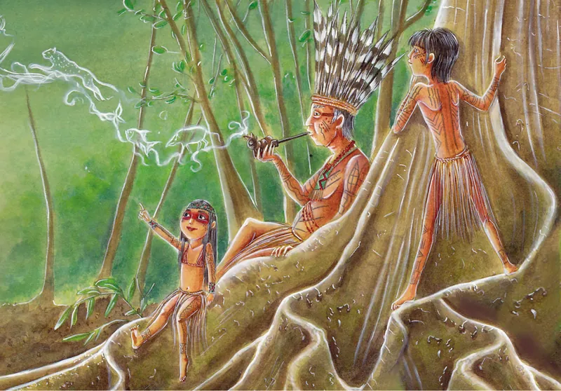 El abuelo, con penacho de plumas, cuenta historias a los niños junto a las raíces de un gran árbol