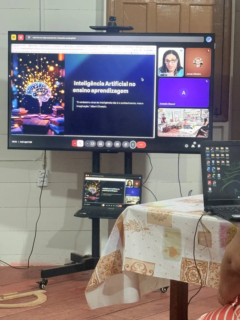 A large screen showing an online session about artificial intelligence in teaching and learning